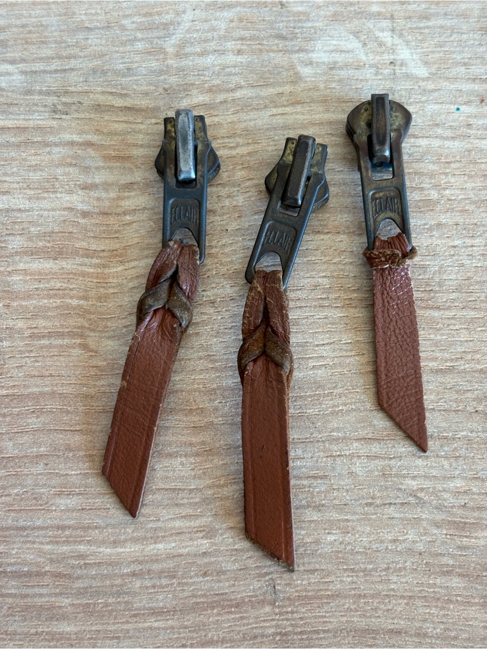 Authentic Louis Vuitton Leather Zipper Pulls set of 3